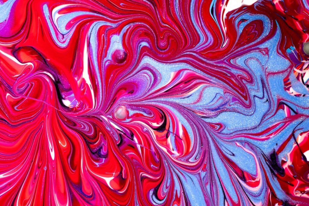 Pearls moving through river of red, blue, and silver