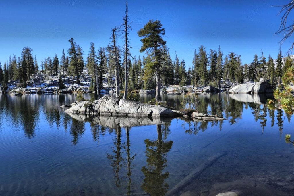 Alpine lake with reflections